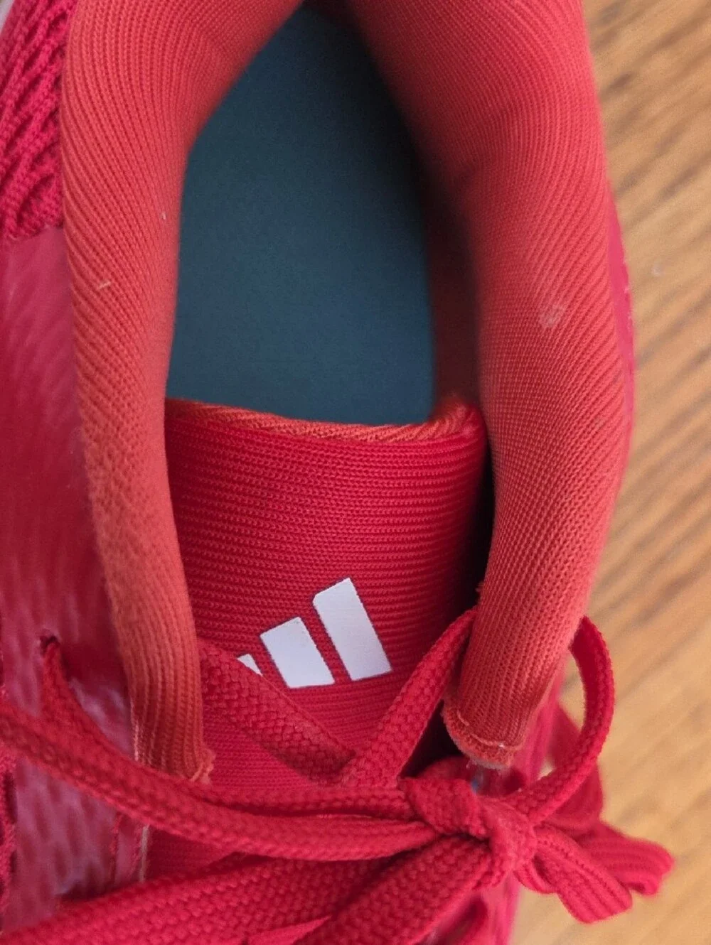 Red ADIDAS Tennis Shoes with Blue Soles